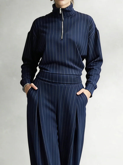 Conjunto de cuello alto con cremallera a rayas