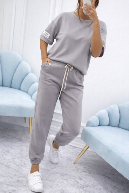 Conjunto de dos piezas para mujer con top liso y pantalón fluido