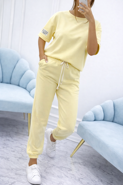 Conjunto de dos piezas para mujer con top liso y pantalón fluido