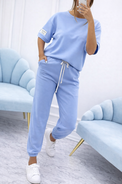 Conjunto de dos piezas para mujer con top liso y pantalón fluido