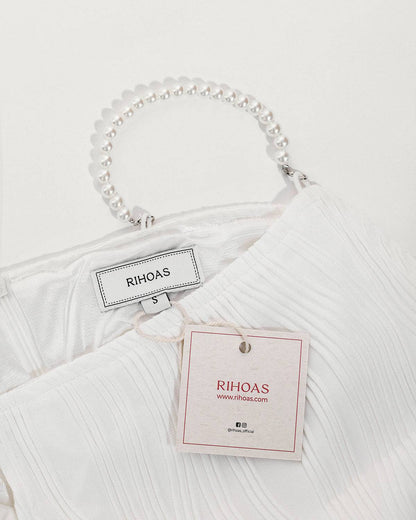 Vestido midi elegante con textura ondulada